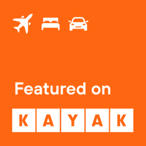Orange promotional badge with white travel icons (airplane, bed, car) and the text 'Featured on KAYAK' in square letter tiles.",